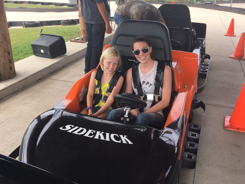 Enjoying Go-Carts With a Cousin