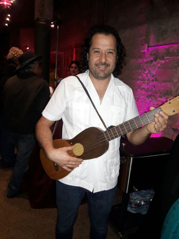 Hector Playing Guitar