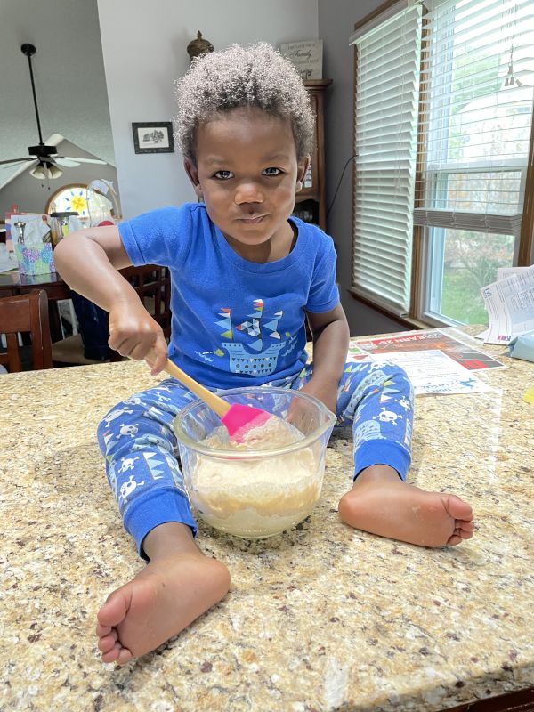 Noah Helping in the Kitchen