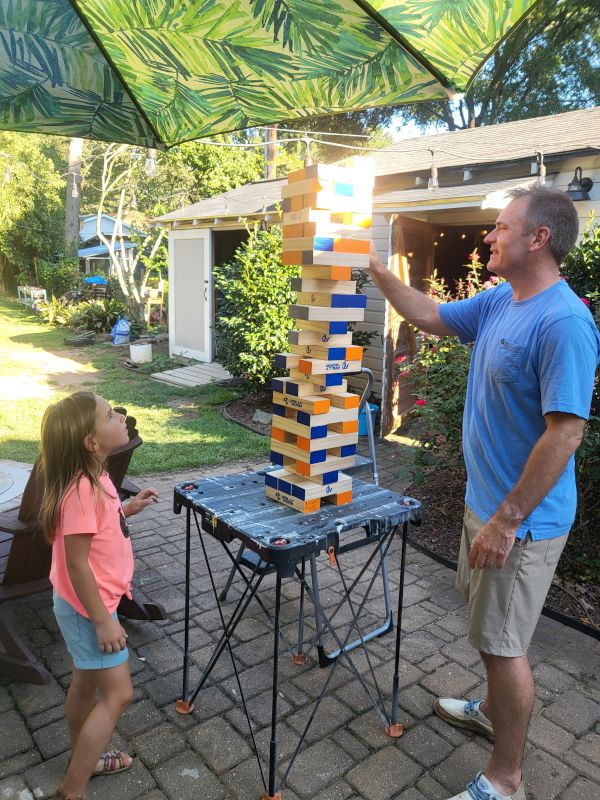 Doug & Our Niece Playing Giant Jenga