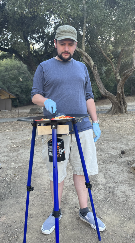 Alexander Making Breakfast While Camping