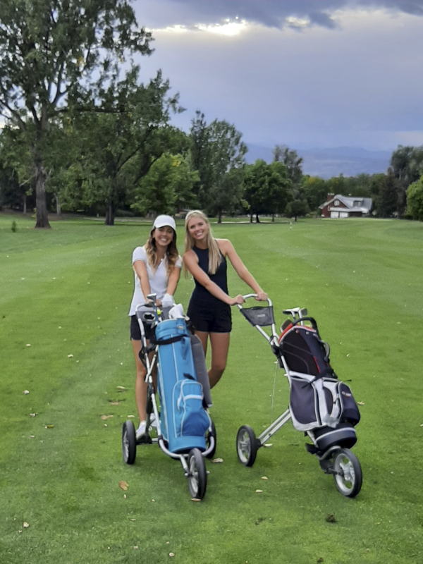 Melanie Golfing With Her Friend