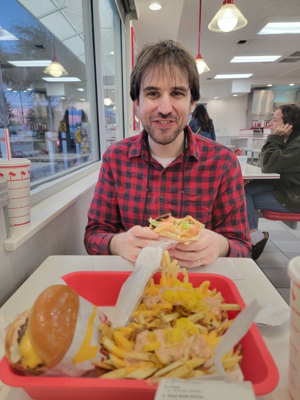 Erick enjoying In-N-Out Burger