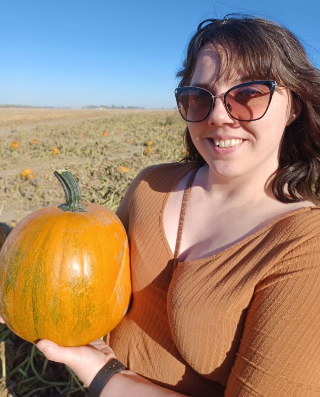 Grace Enjoying a Day at the Pumpkin Patch