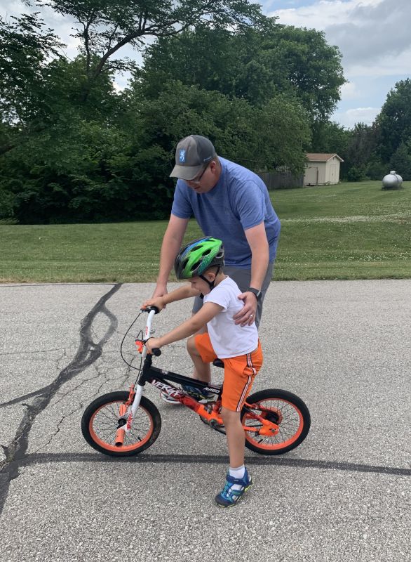 Helping Our Friends' Son Learn to Ride His Bike