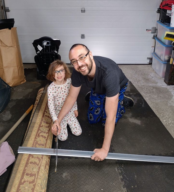 Teaching Evie to Use a Saw