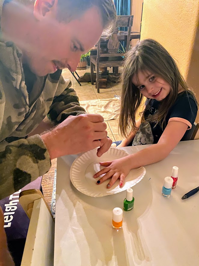Andy Painting His Niece's Nails