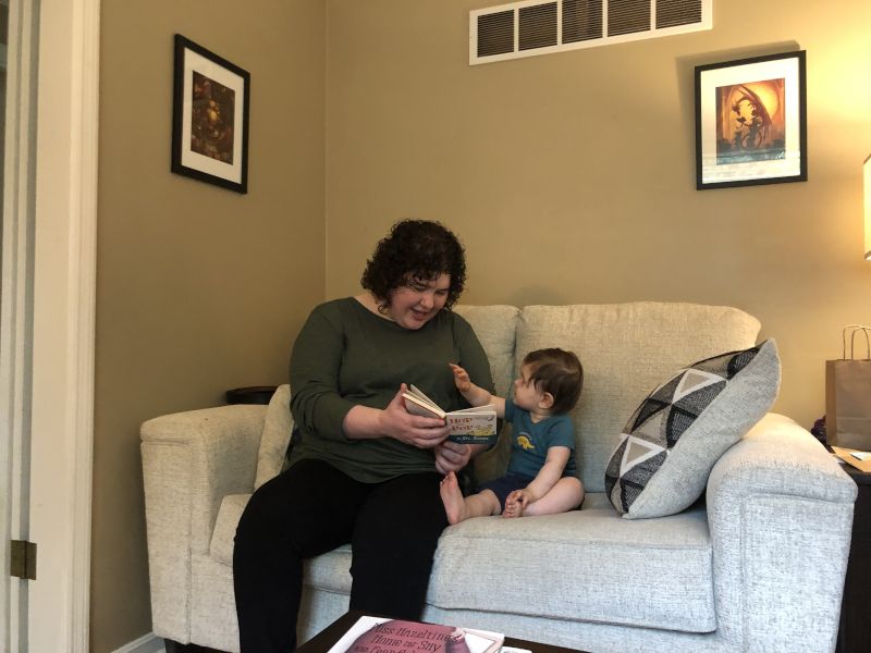 Stephanie Reading With Our Friends' Child