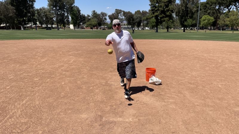 Adam Playing Softball