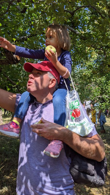 Annie Gets a Boost to Pick the Apples